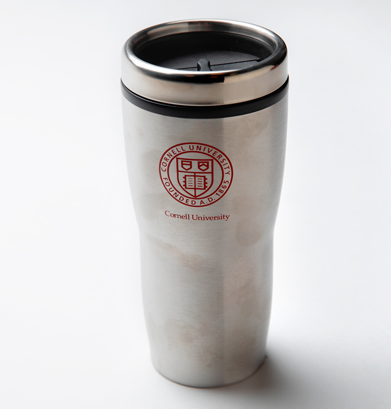 Silver travel mug with Cornell insignia