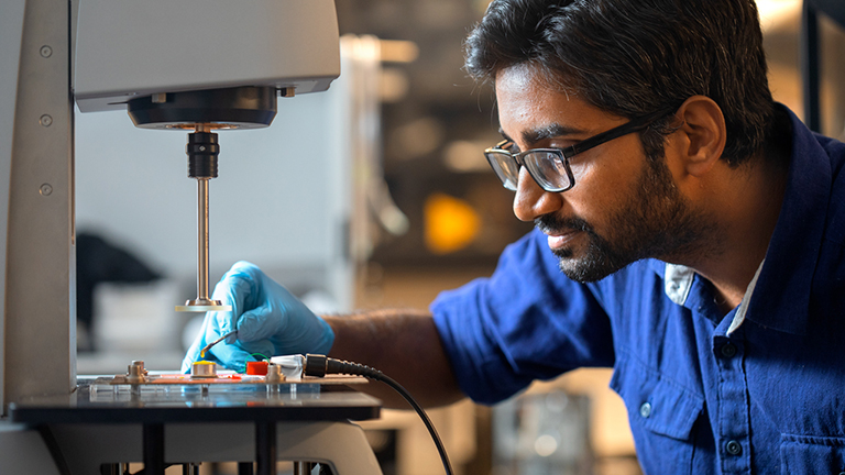 PhD student Prateek Sehgal work with shear thickening fluid in their Clark Hall lab.